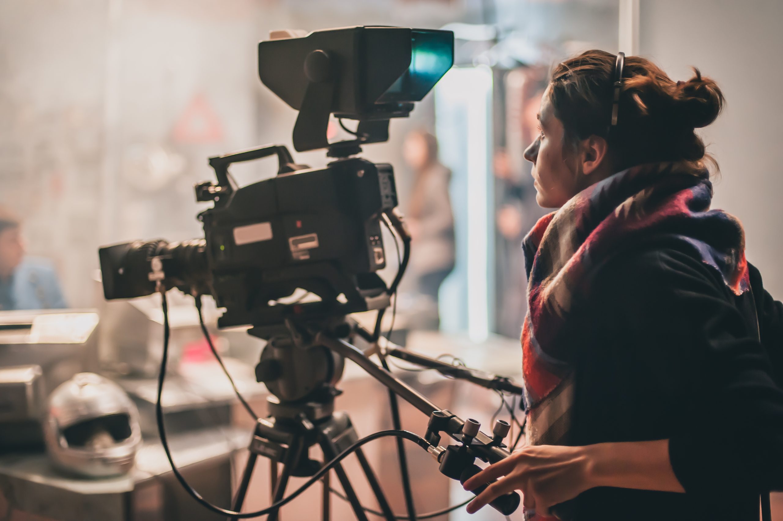 Women filming with a camera